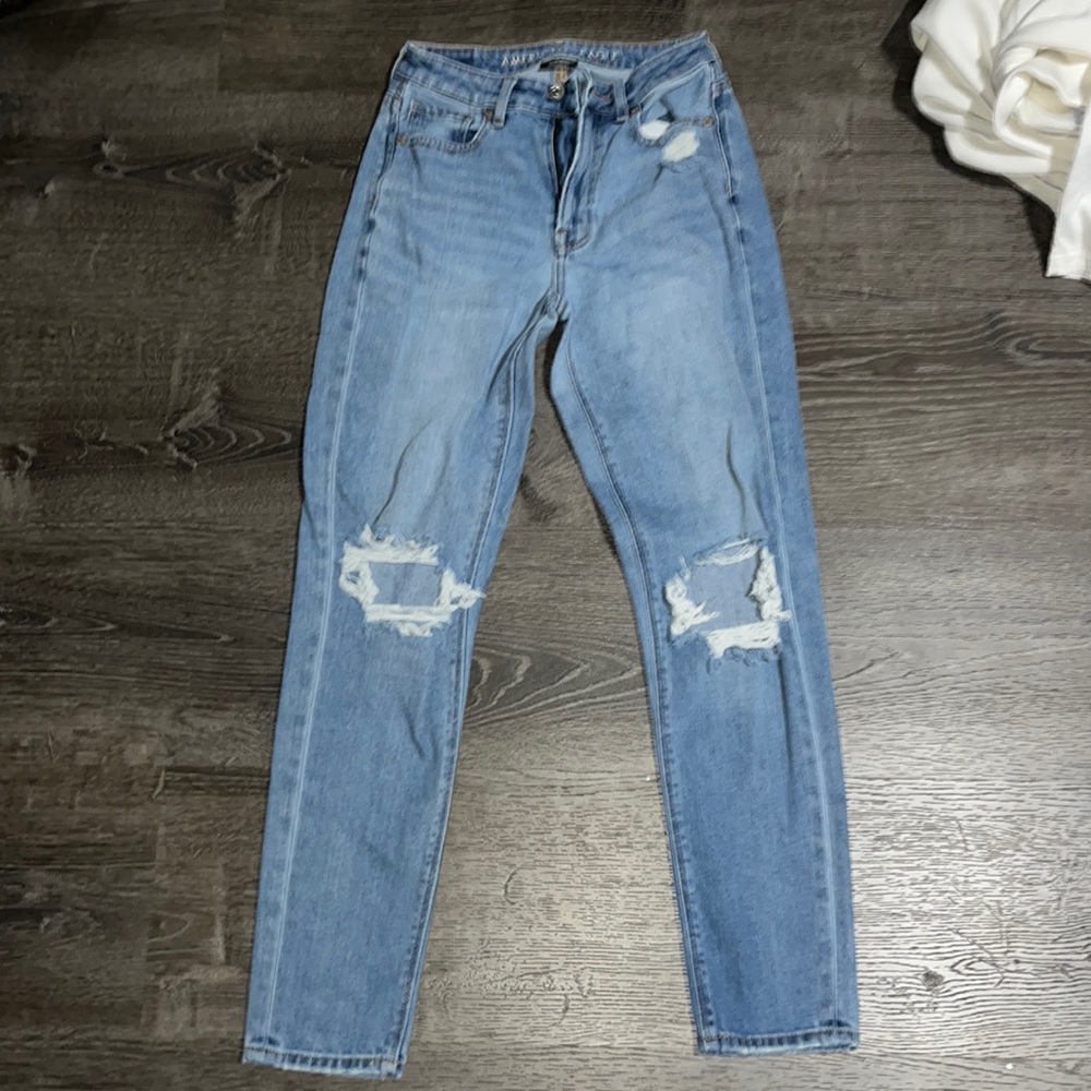 blue ripped jeans